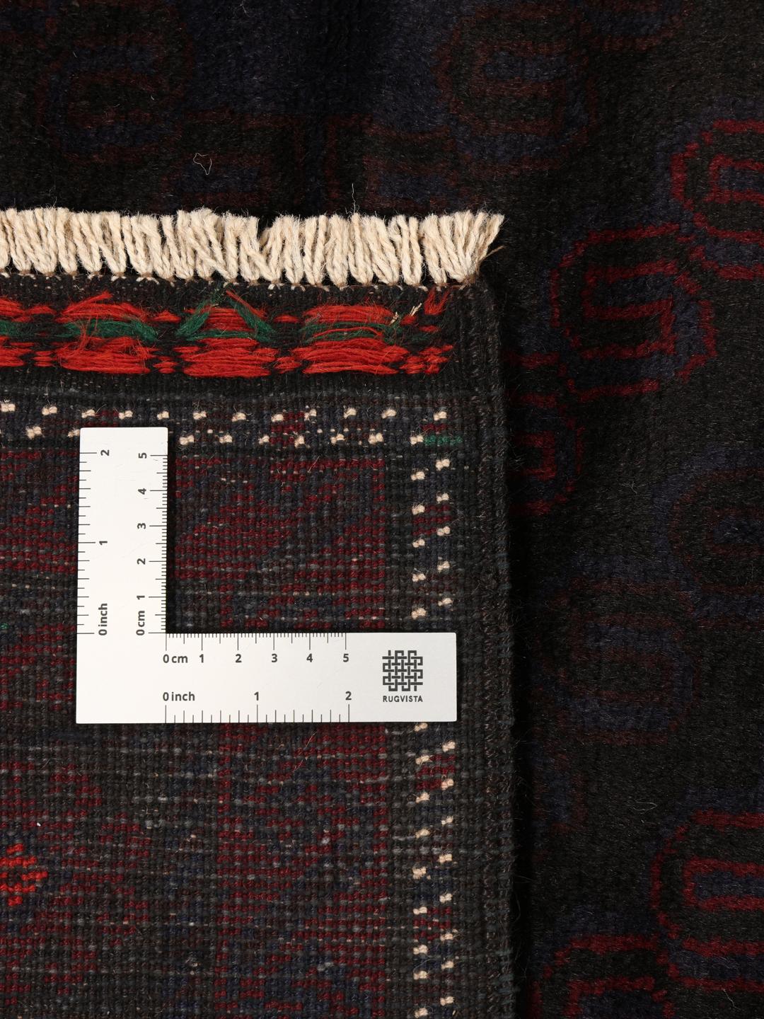Handgeknoopt Beluch-wollen tapijt uit Afghanistan in donkerrode en zwarte tinten