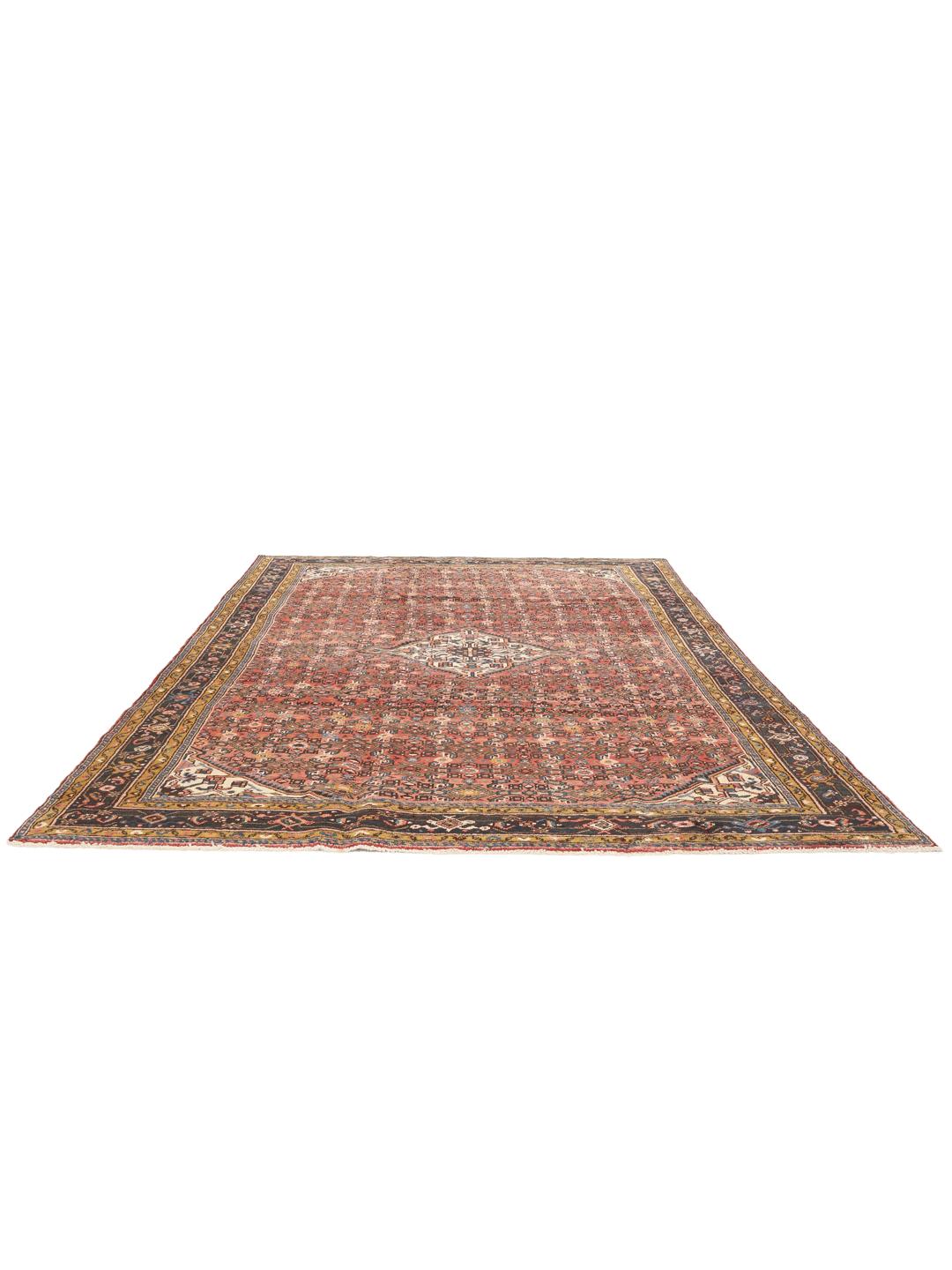 Hand-knotted Hosseinabad Wool rug from the Middle East in deep red