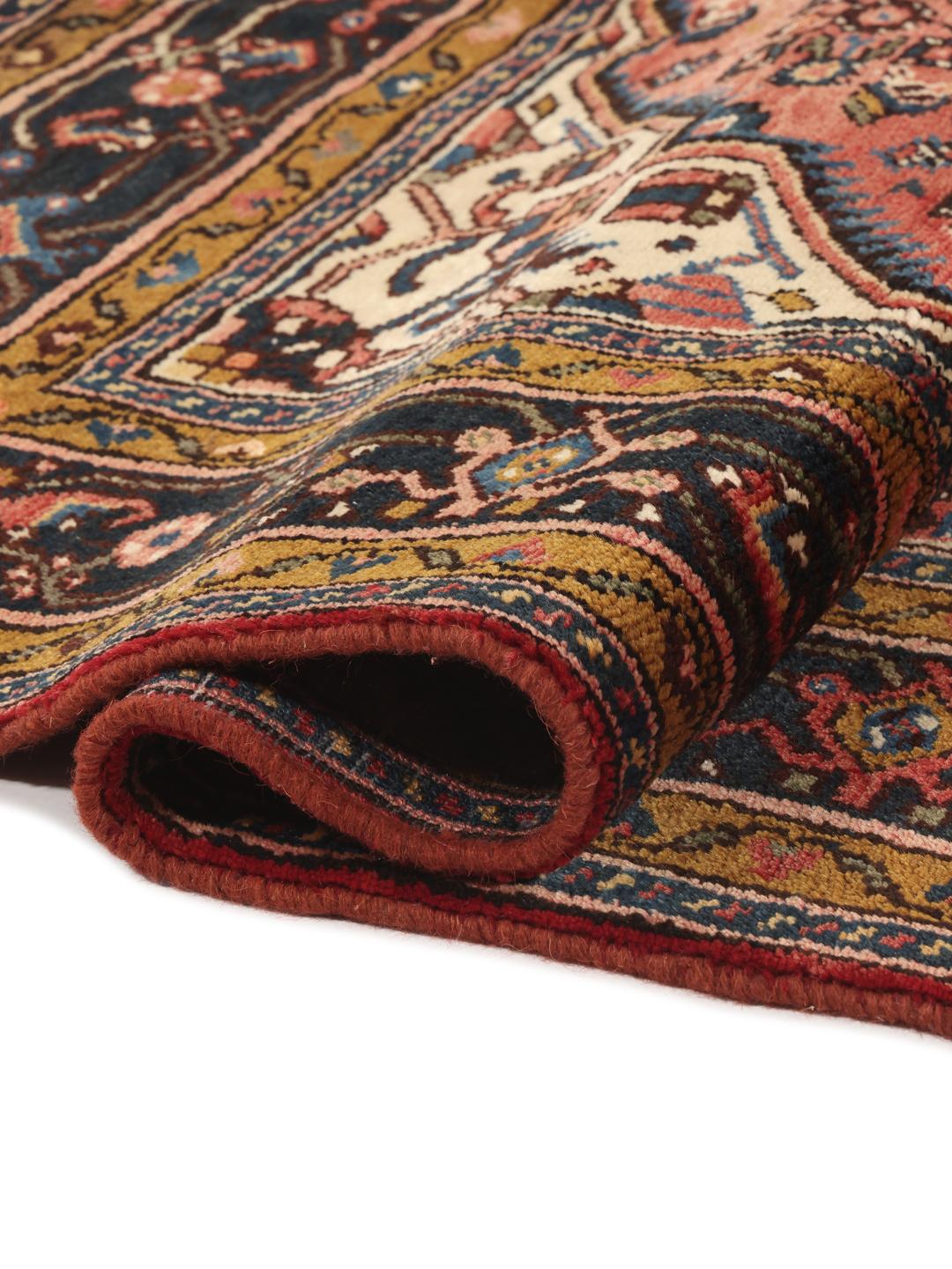 Hand-knotted Hosseinabad Wool rug from the Middle East in deep red