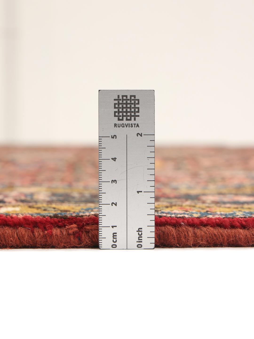 Hand-knotted Hosseinabad Wool rug from the Middle East in deep red