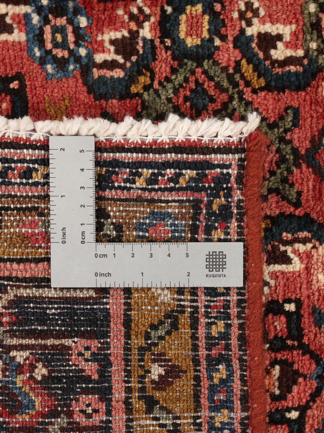 Hand-knotted Hosseinabad Wool rug from the Middle East in deep red
