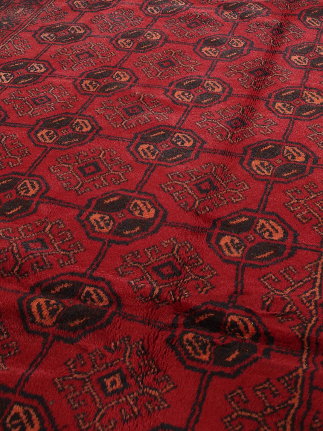 Handgeknoopte Afghaanse loper in rood met geometrische motieven