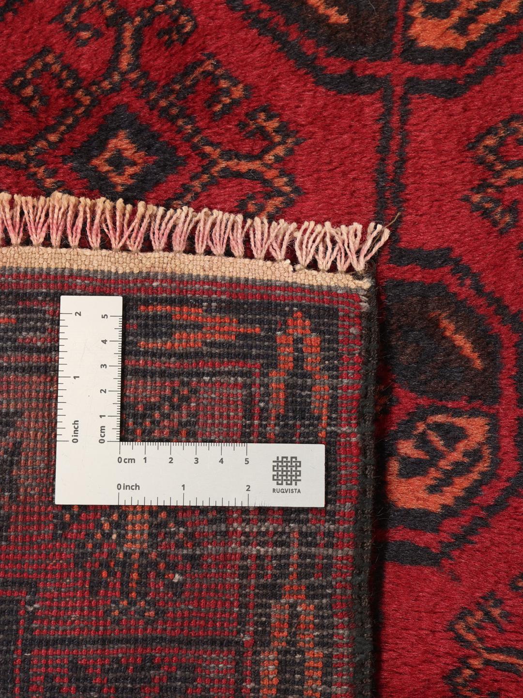 Handgeknoopte Afghaanse loper in rood met geometrische motieven