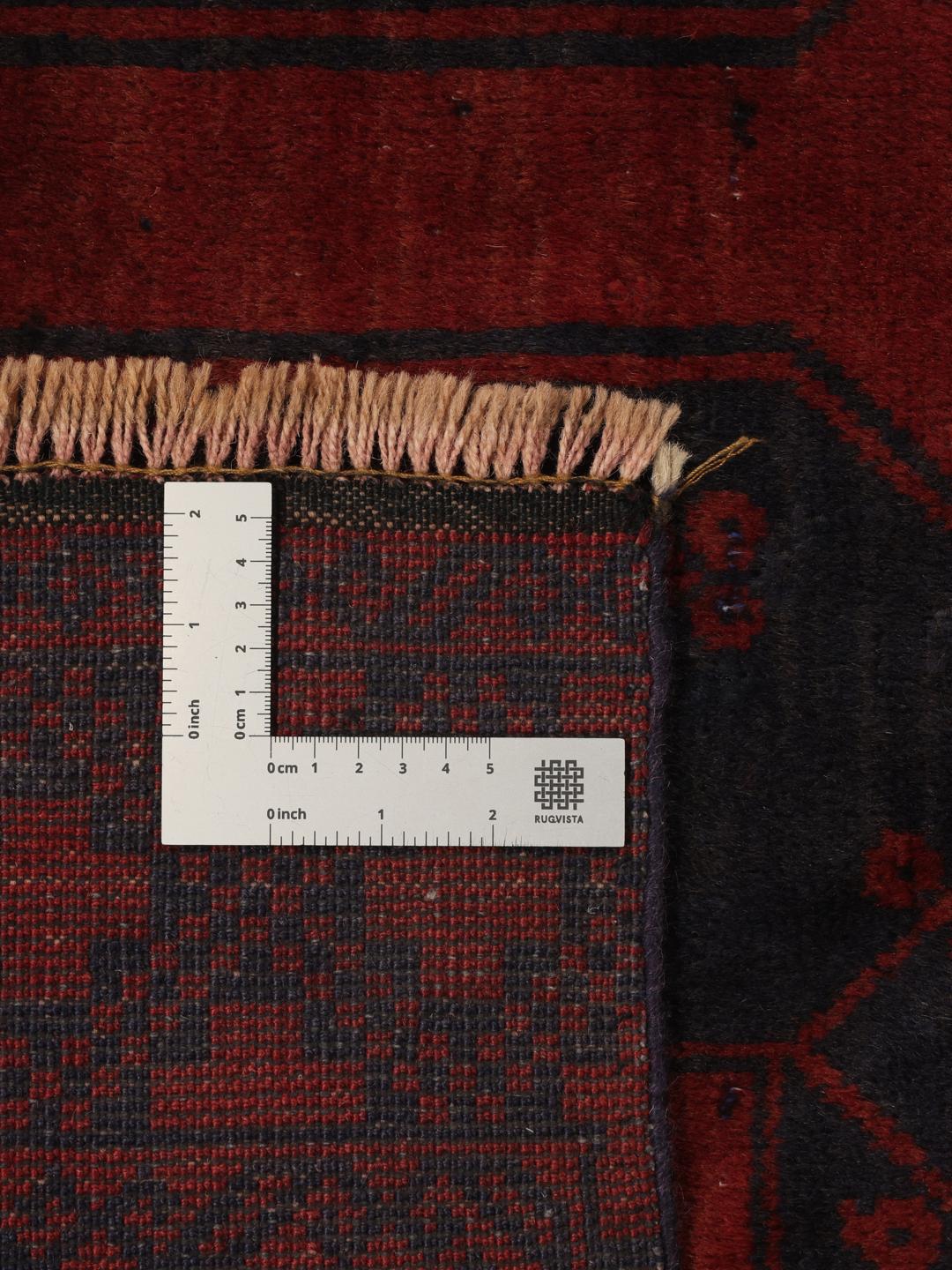 Håndknyttet afghansk løber i mørkerød og mørkeblå med traditionelle motiver