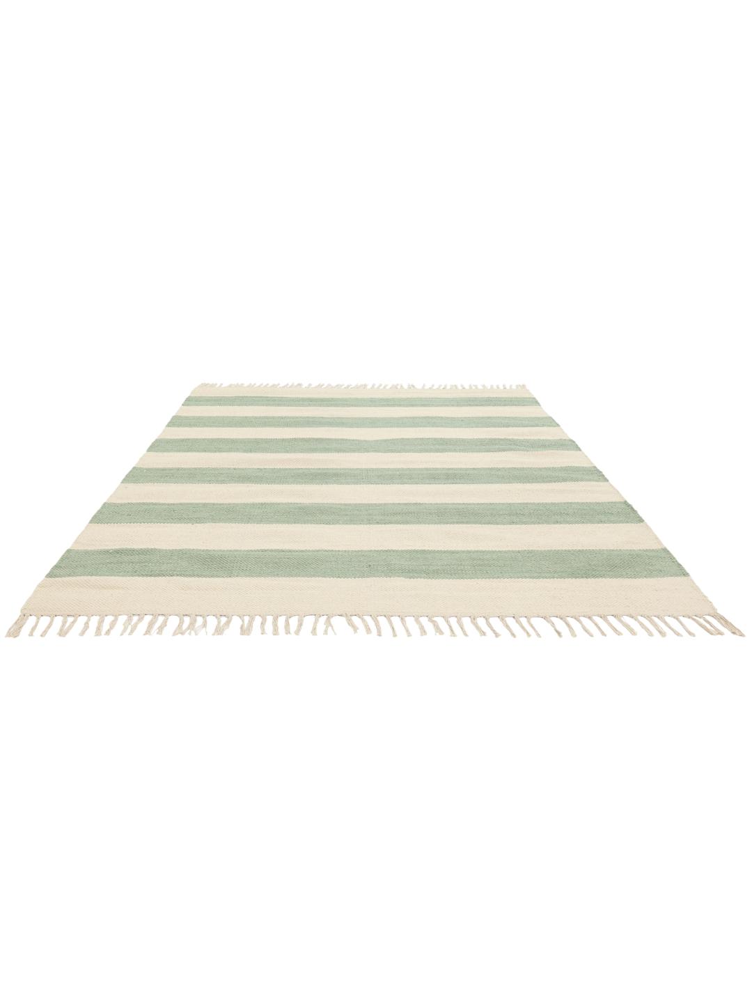 A hand-woven cotton rug featuring a mint green and cream striped pattern with fringe ends.