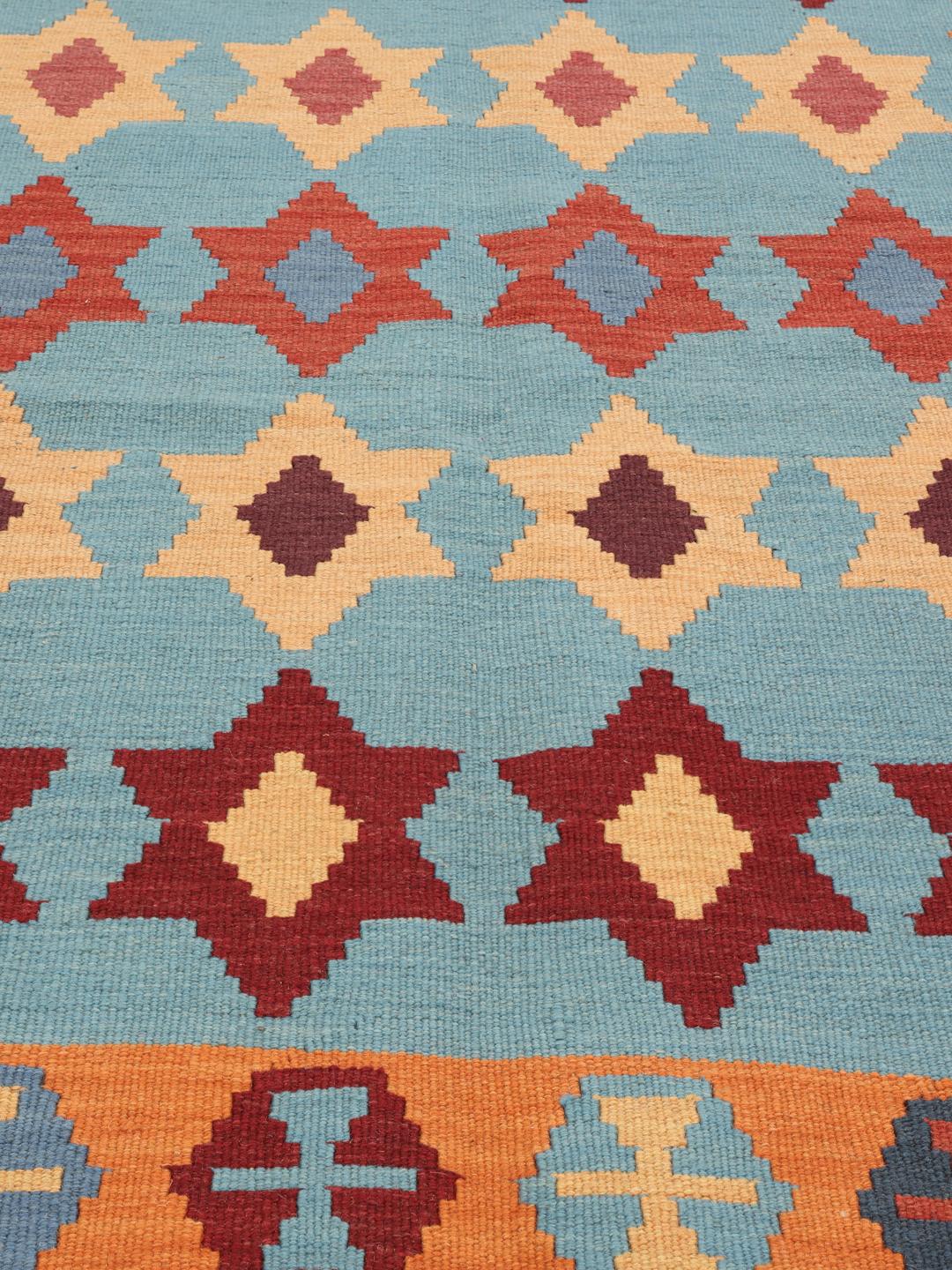 Handgeweven veelkleurig kelim-kleed uit het Midden-Oosten met geometrische motieven