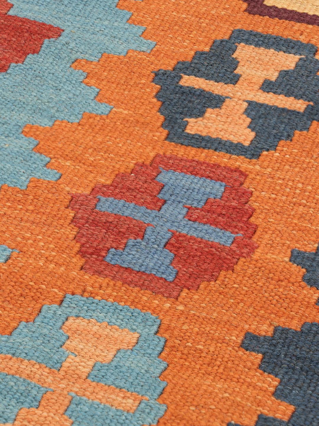 Handgeweven veelkleurig kelim-kleed uit het Midden-Oosten met geometrische motieven