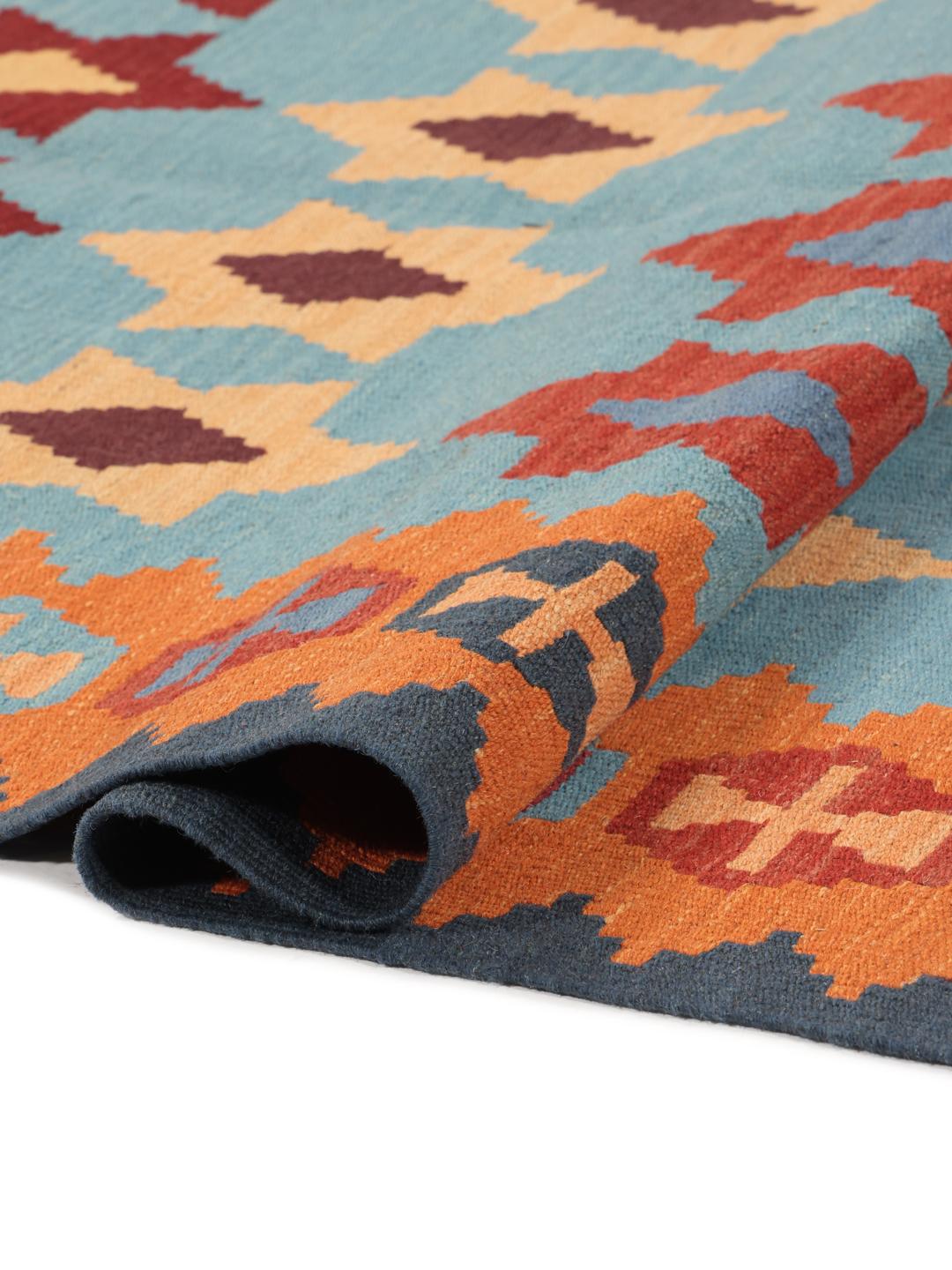 Handgeweven veelkleurig kelim-kleed uit het Midden-Oosten met geometrische motieven