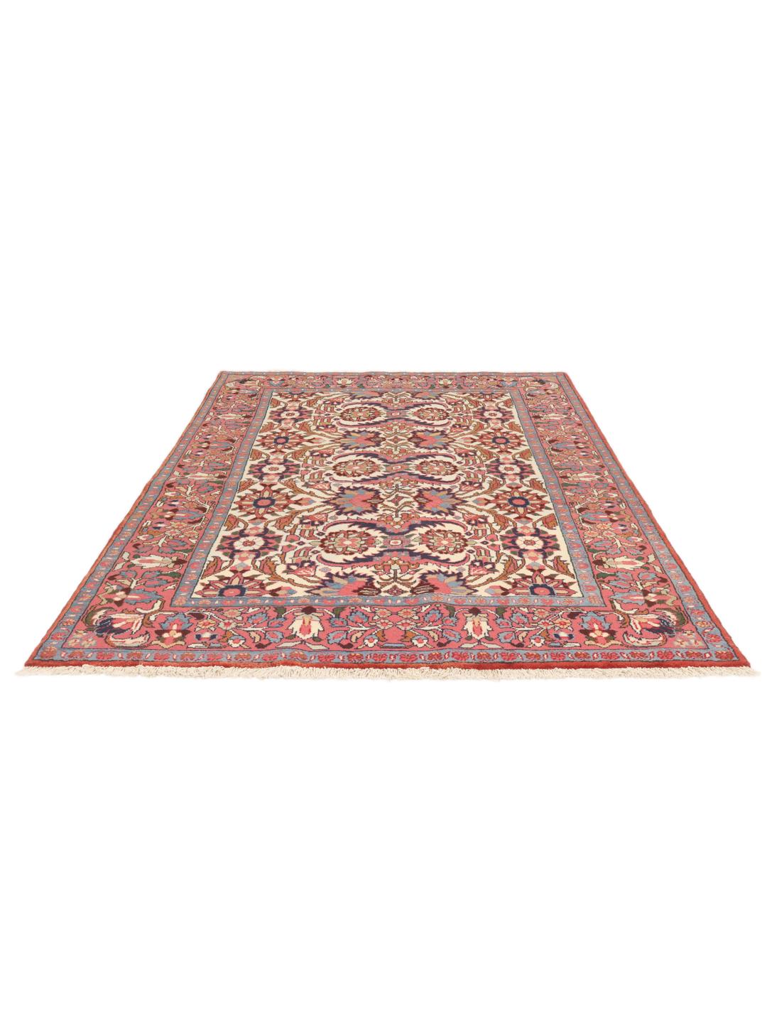 Handgeknoopt Rudbar-kleed met bloemmotieven in rood en beige uit het Midden-Oosten