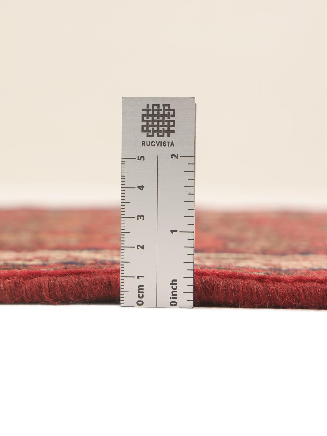 Hand-knotted Asadabad runner in red from the Middle East