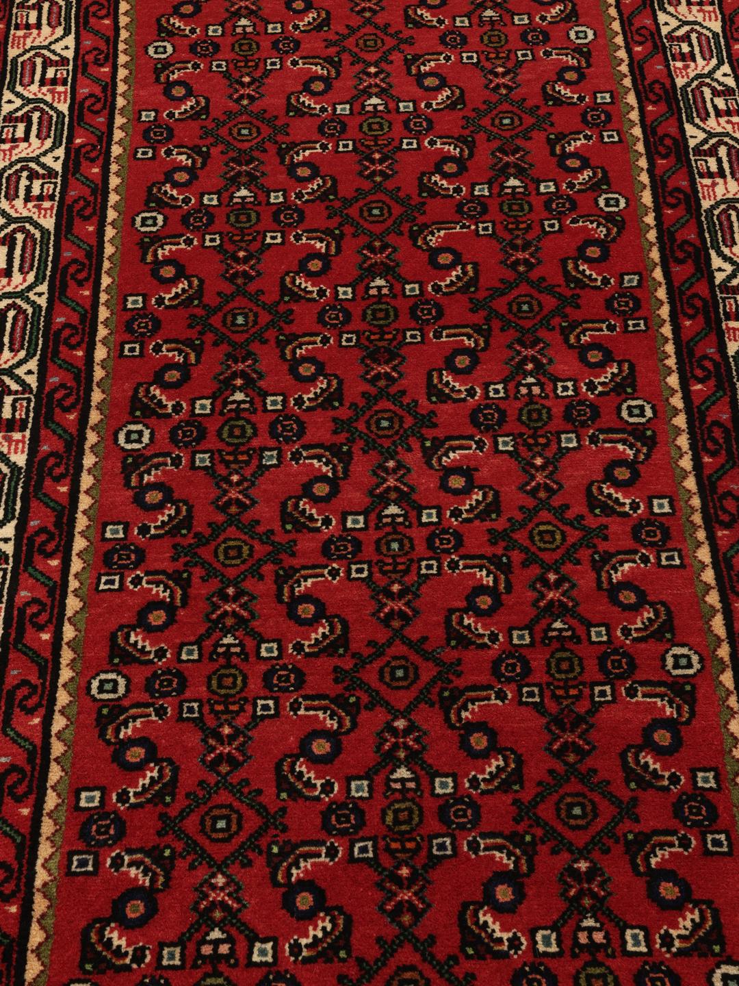 Hand-knotted red Hamadan runner from the Middle East