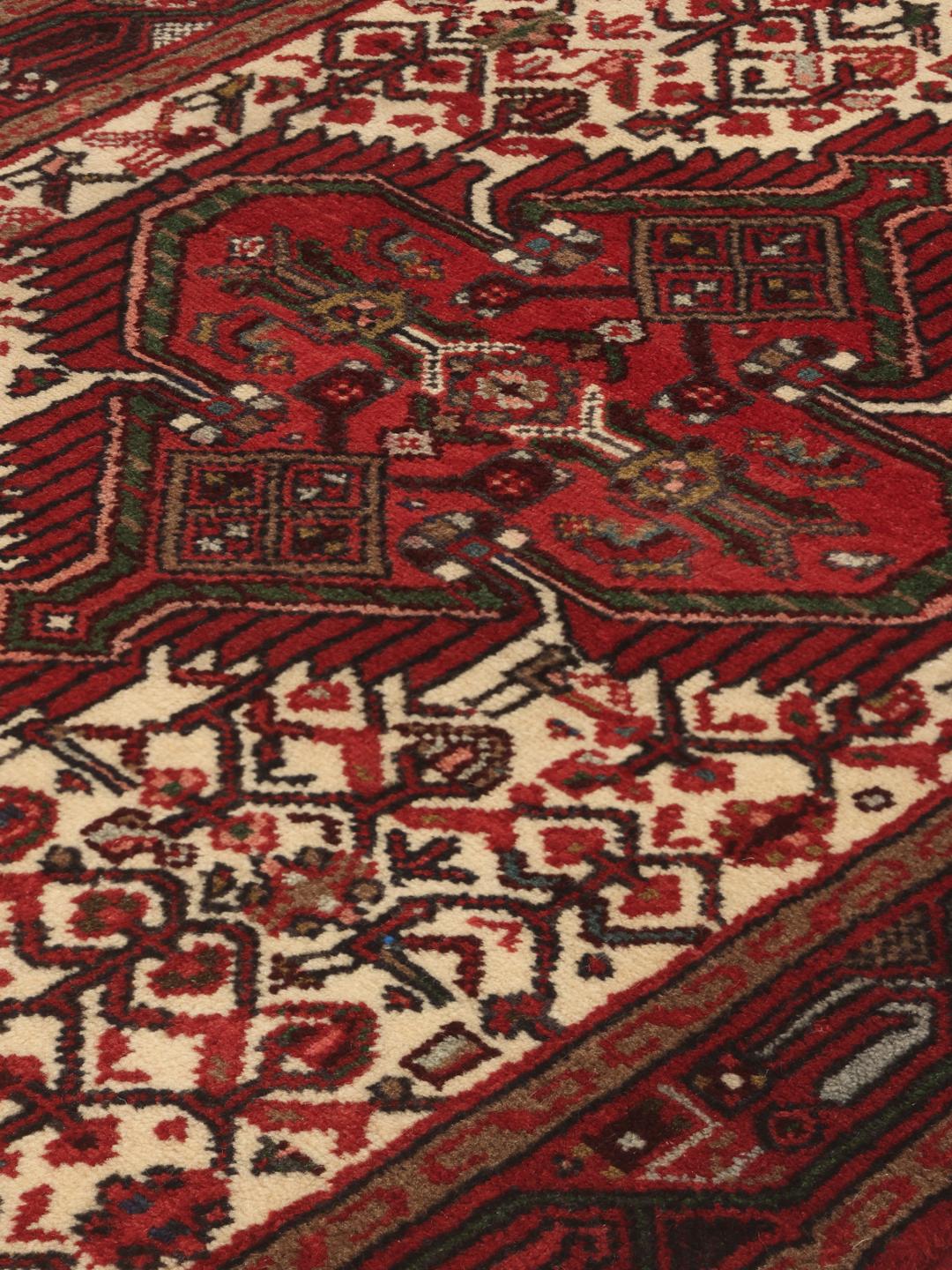 Hand-knotted Asadabad runner with geometric red and cream patterns