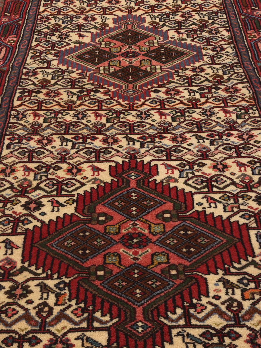 Hand-knotted Asadabad runner from the Middle East in shades of red and beige