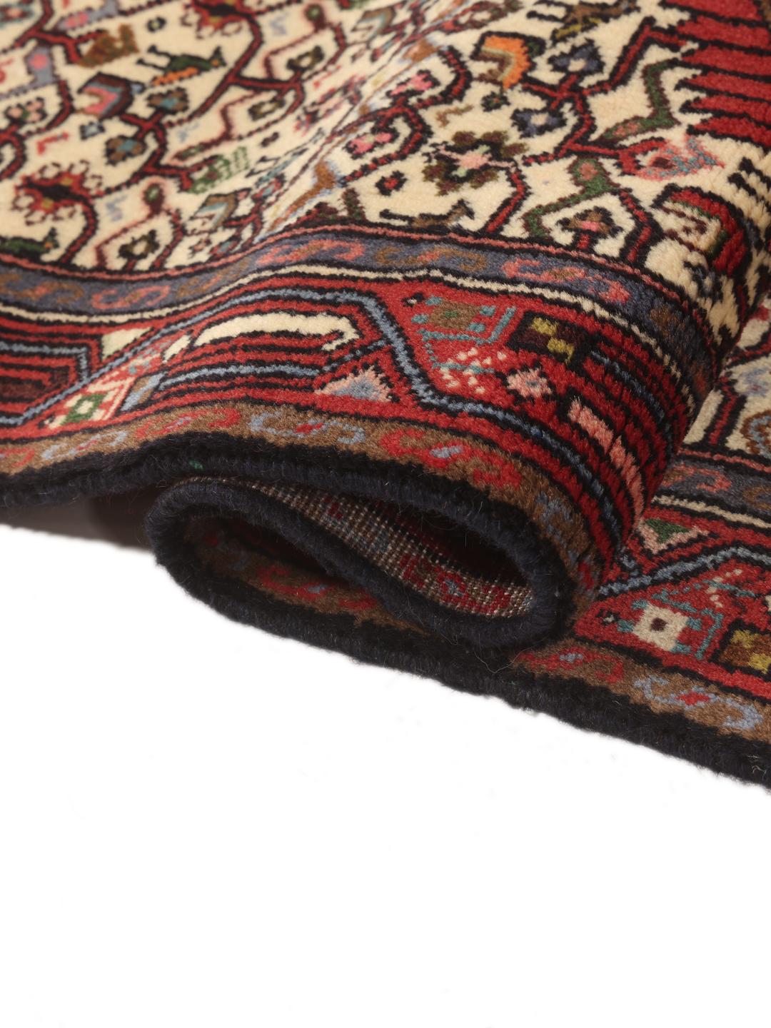 Hand-knotted Asadabad runner from the Middle East in shades of red and beige