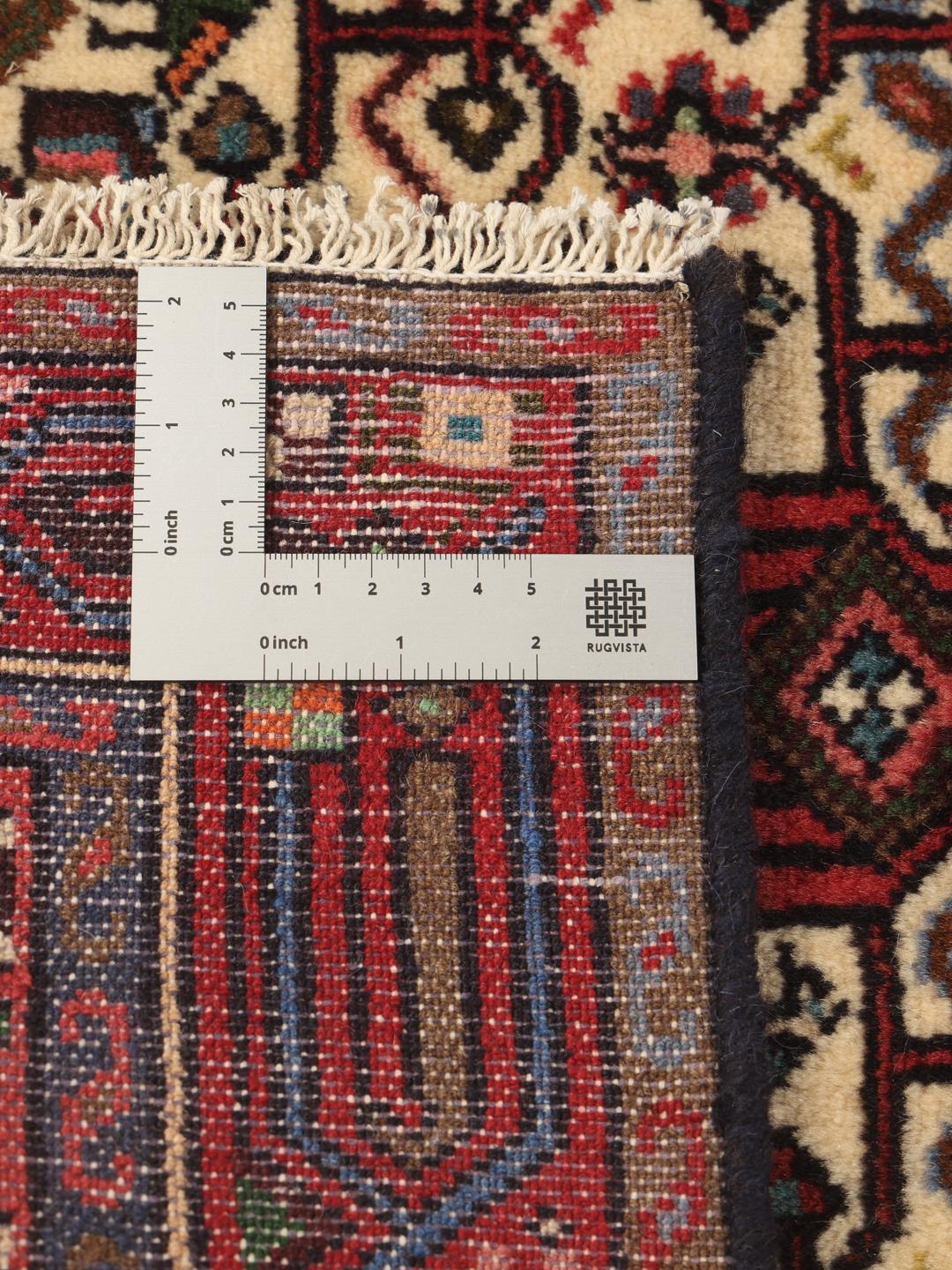 Hand-knotted Asadabad runner from the Middle East in shades of red and beige