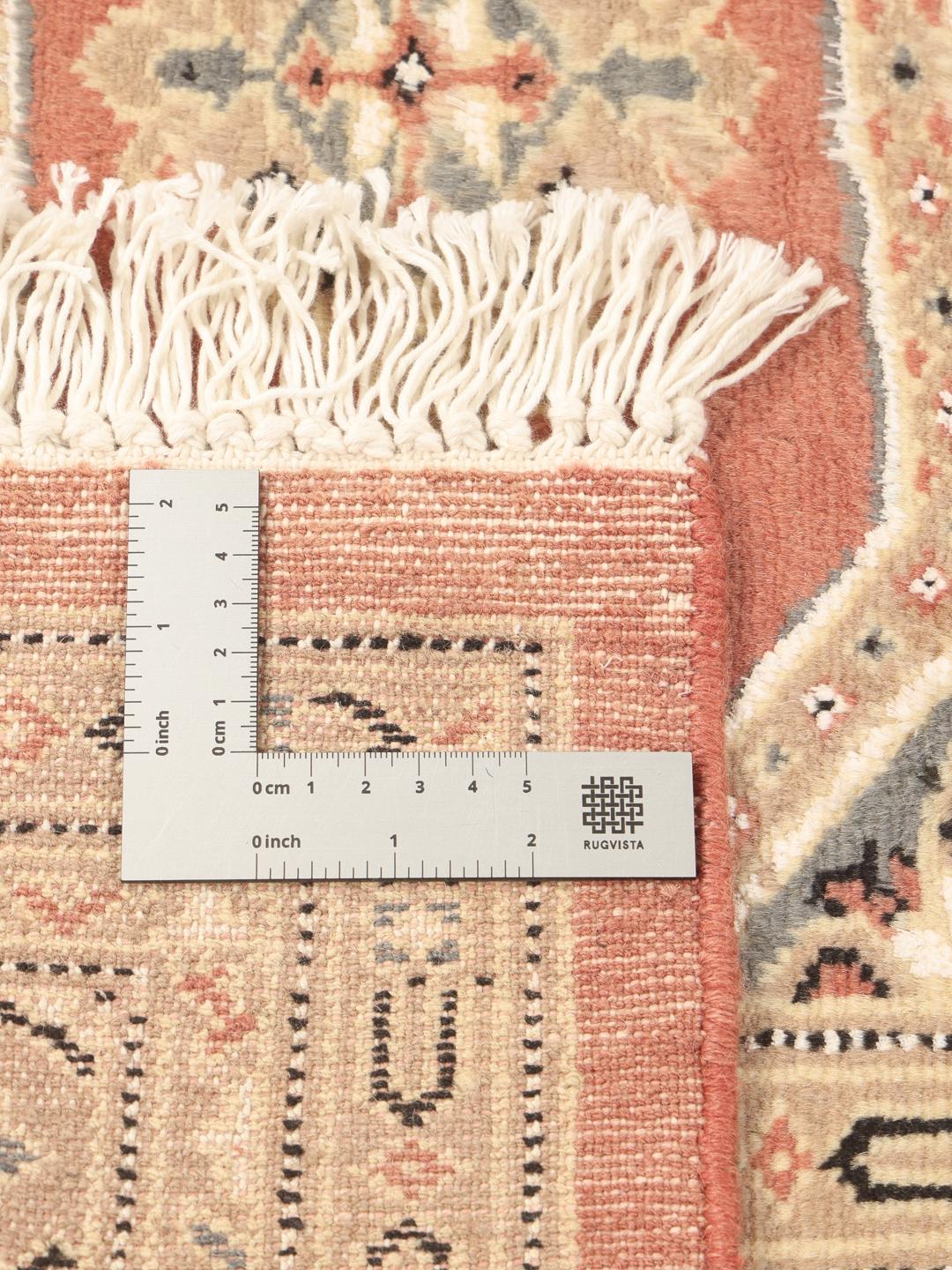 Hand-knotted Pakistan Bokhara 2ply rug in red with detailed tribal motifs