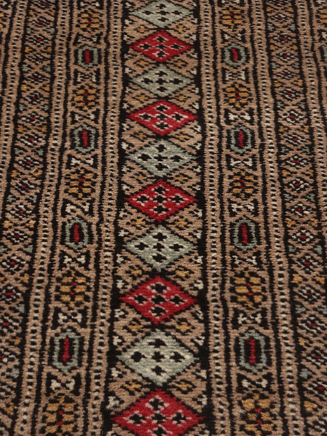 Hand-knotted Pakistan Bokhara 2ply rug in red with traditional geometric motifs