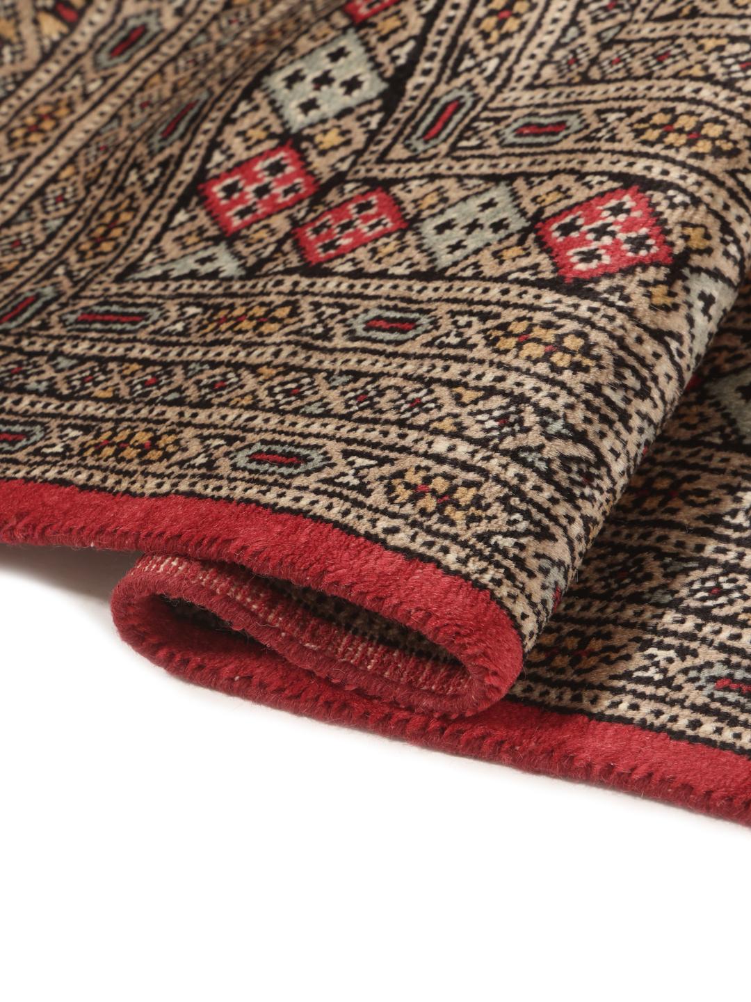 Hand-knotted Pakistan Bokhara 2ply rug in red with traditional geometric motifs