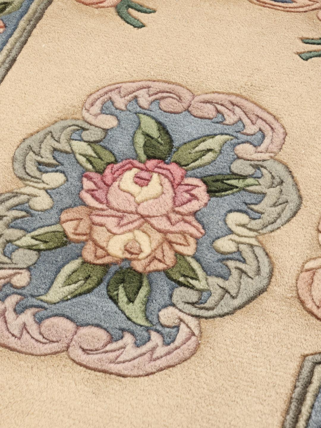Handgeknoopt Chinees tapijt met bloemmotief in beige en blauw