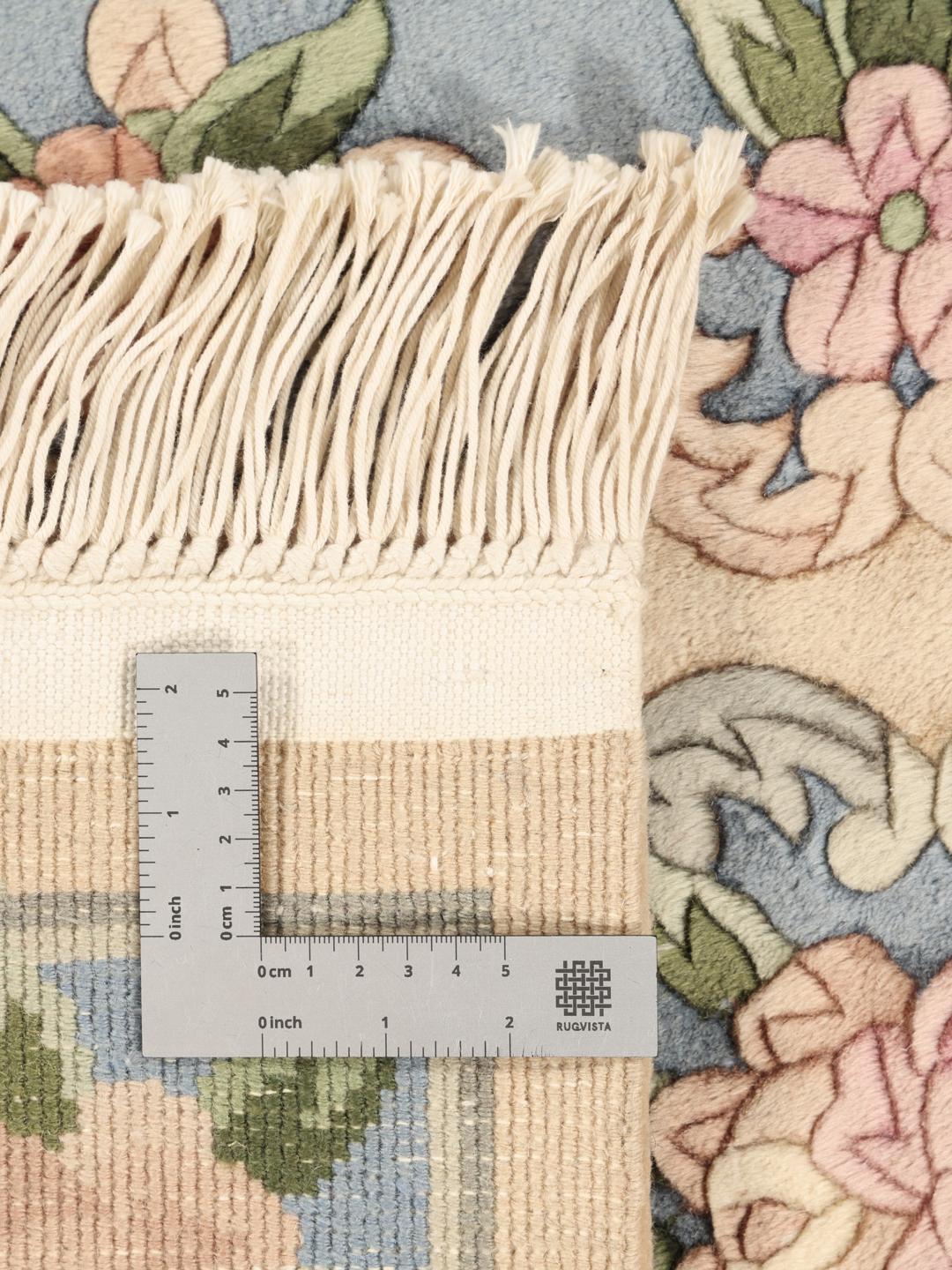 Handgeknoopt Chinees tapijt met bloemmotief in beige en blauw