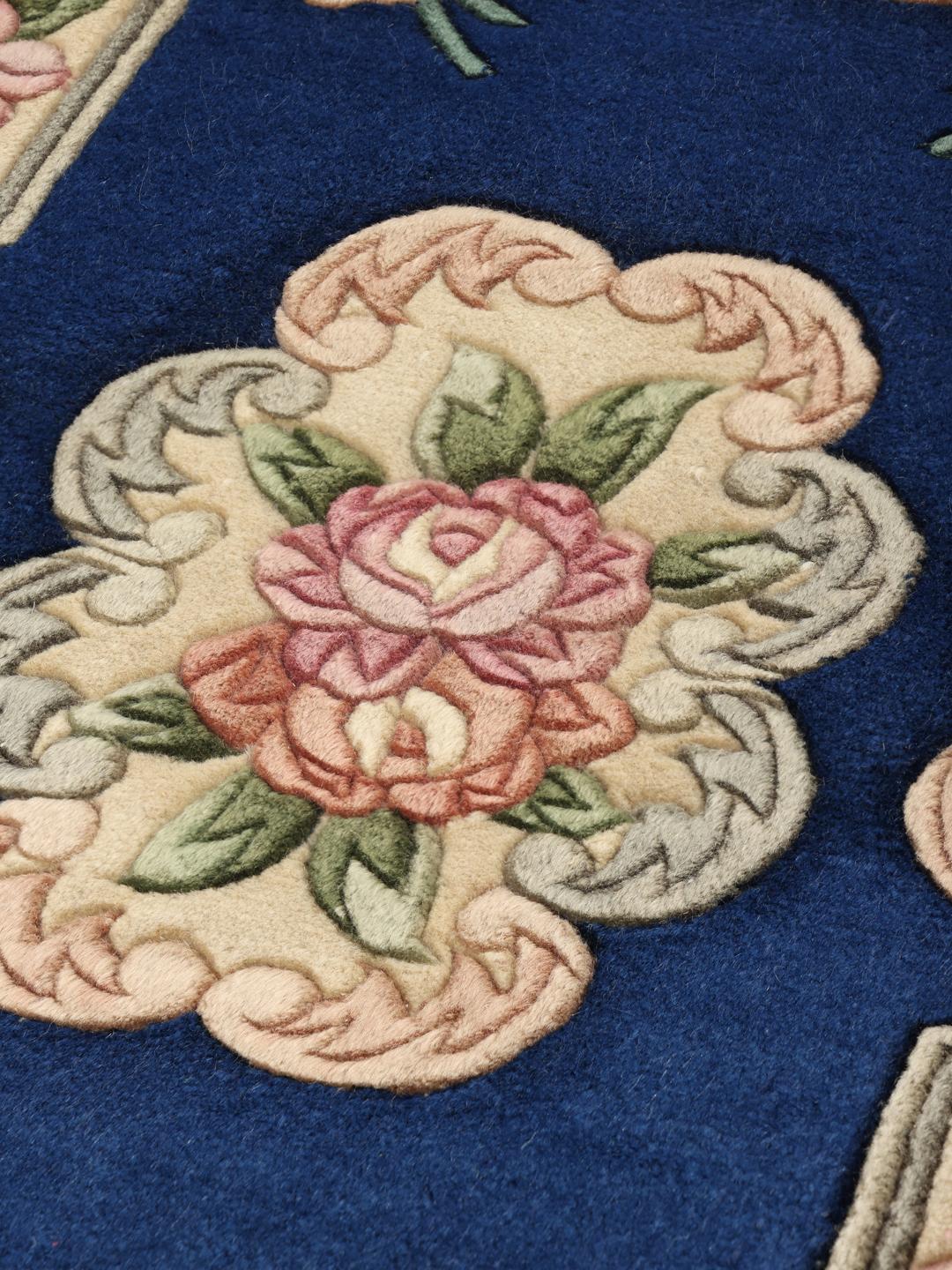 Håndknyttet kinesisk tæppe med blå flade og blomstermønster