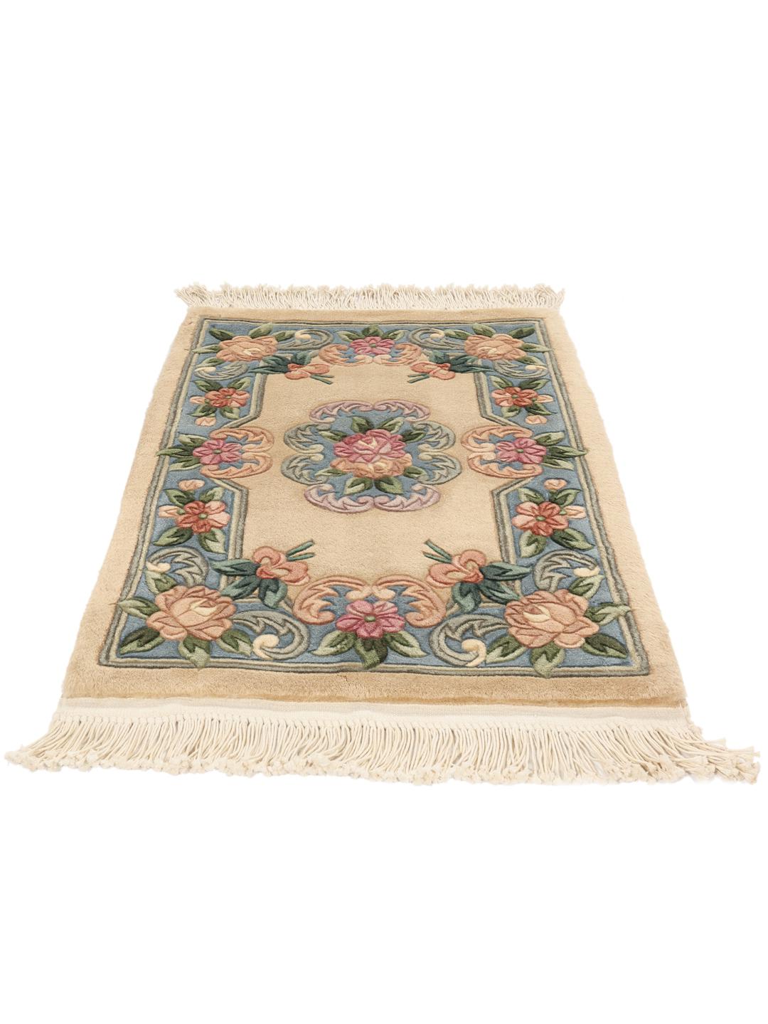 Hand-knotted floral rug from China in beige and soft blue tones