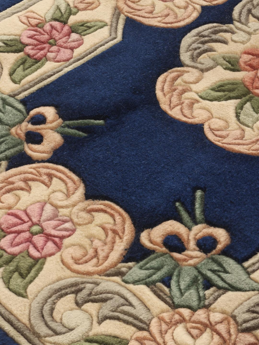 Hand-knotted Chinese rug with a floral design in blue and beige