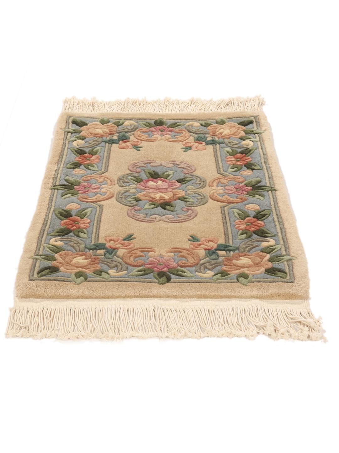 Hand-knotted floral rug from China with a beige and blue colour palette