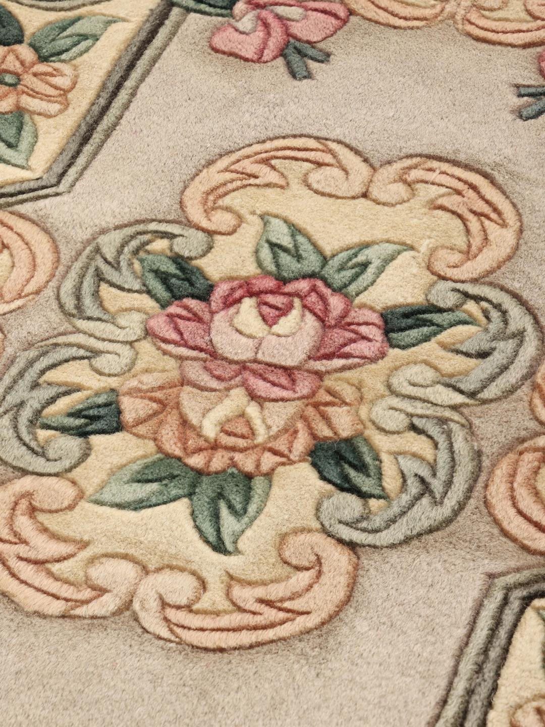 Hand-knotted Chinese rug with floral motifs in beige, pink, and green