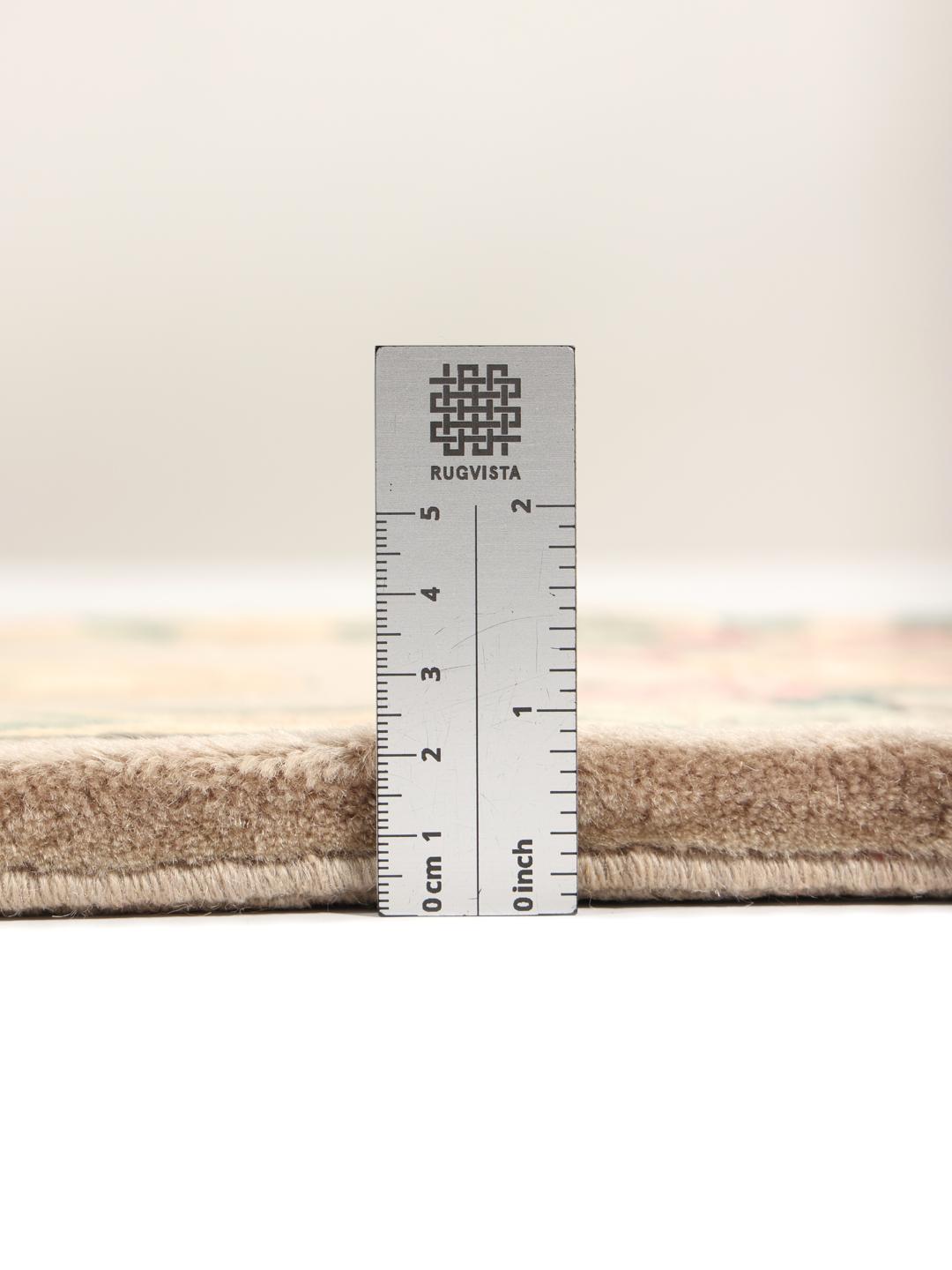 Hand-knotted Chinese rug with floral motifs in beige, pink, and green