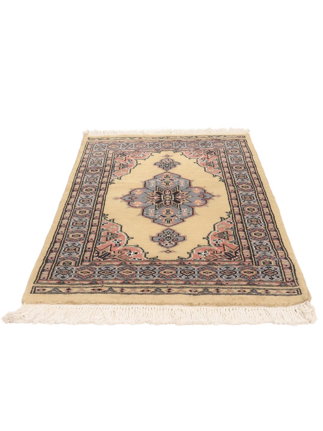 Hand-knotted Pakistan Bokhara rug with a beige field and medallion pattern