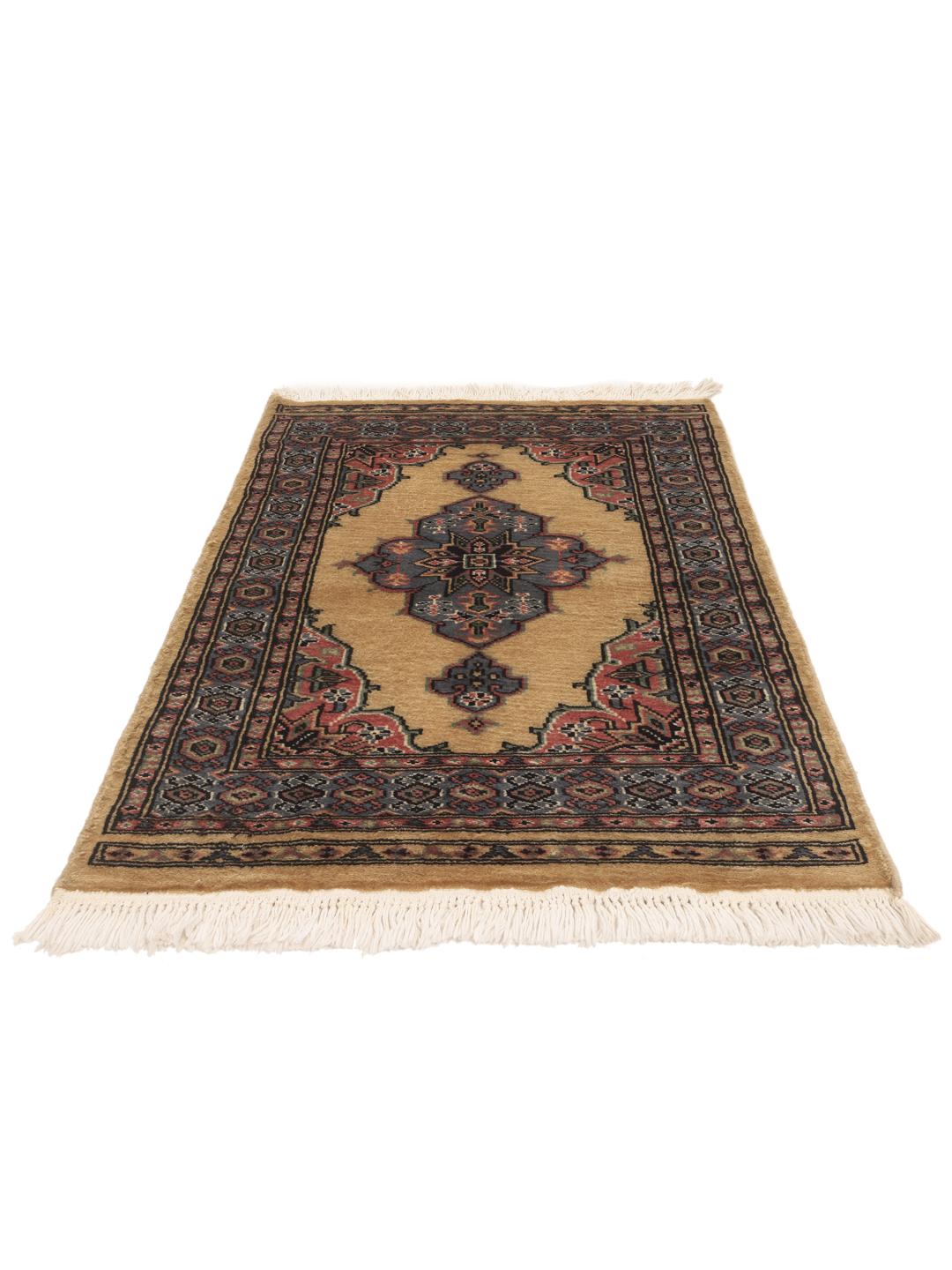 Hand-knotted Pakistan Bokhara rug with a beige field and medallion pattern