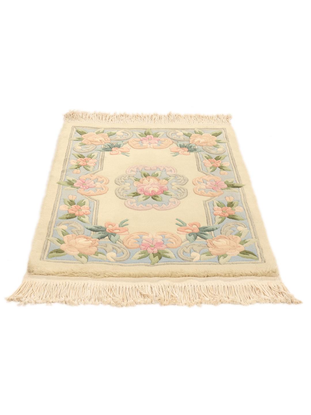 Handgeknoopt bloemig tapijt uit China met beige en blauwe tinten