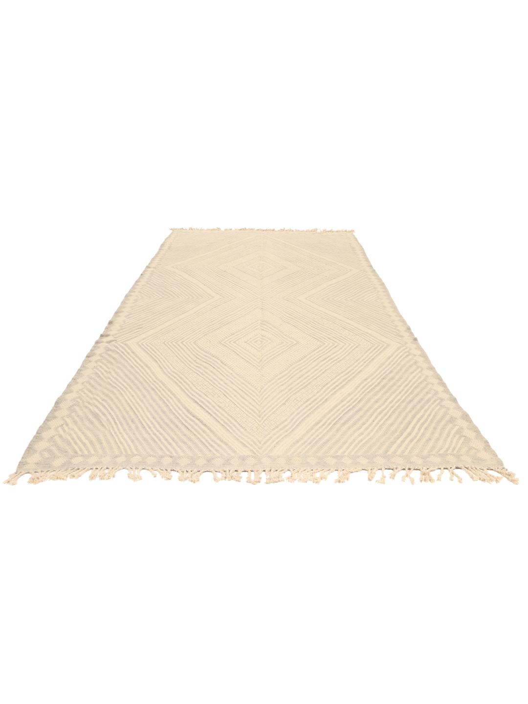 Hand-woven Moroccan rug with diamond patterns in beige and grey