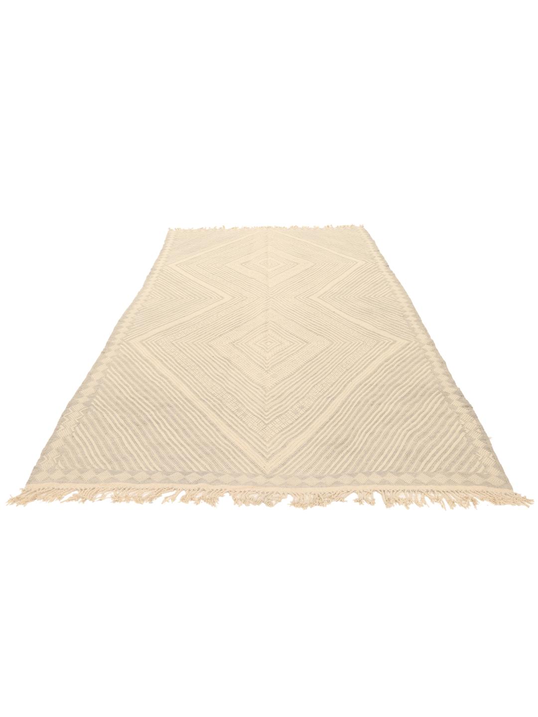 Hand-woven Moroccan rug with diamond patterns in beige and grey