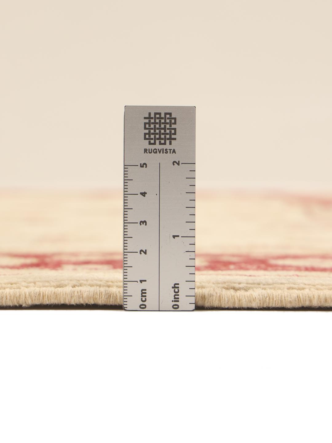 Handgeknoopt Afghaans tapijt met een bloemendesign in beige en rood