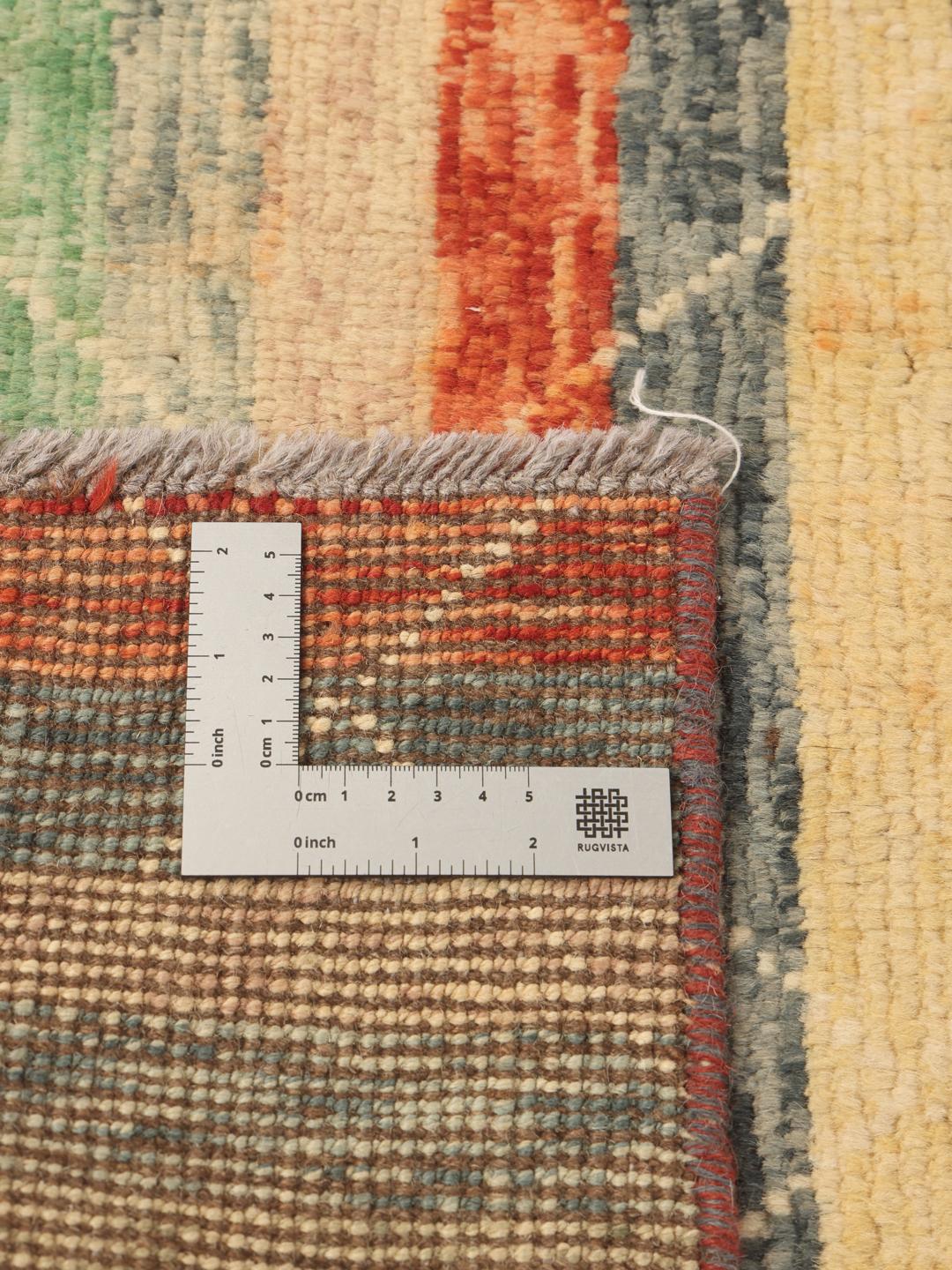 Tapis afghan noué à la main avec un motif rayé multicolore
