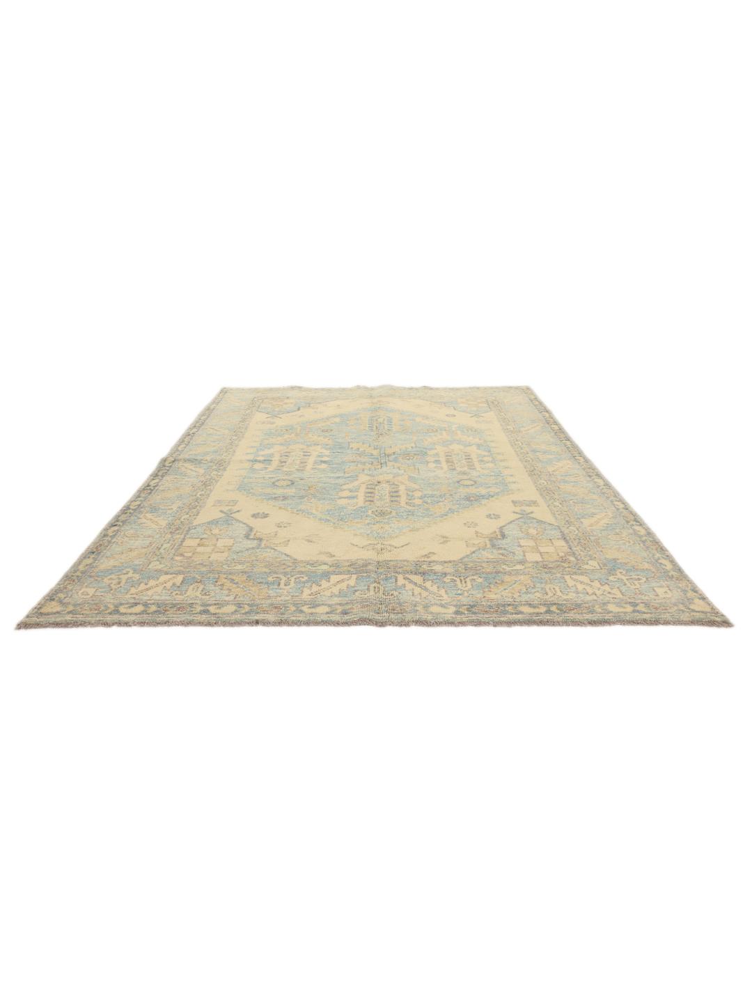 Handgeknoopt Afghaans tapijt met een blauw en beige medaillonpatroon