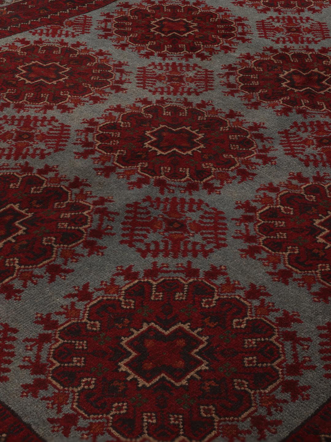 Hand-knotted Afghan Khal Mohammadi rug in deep red