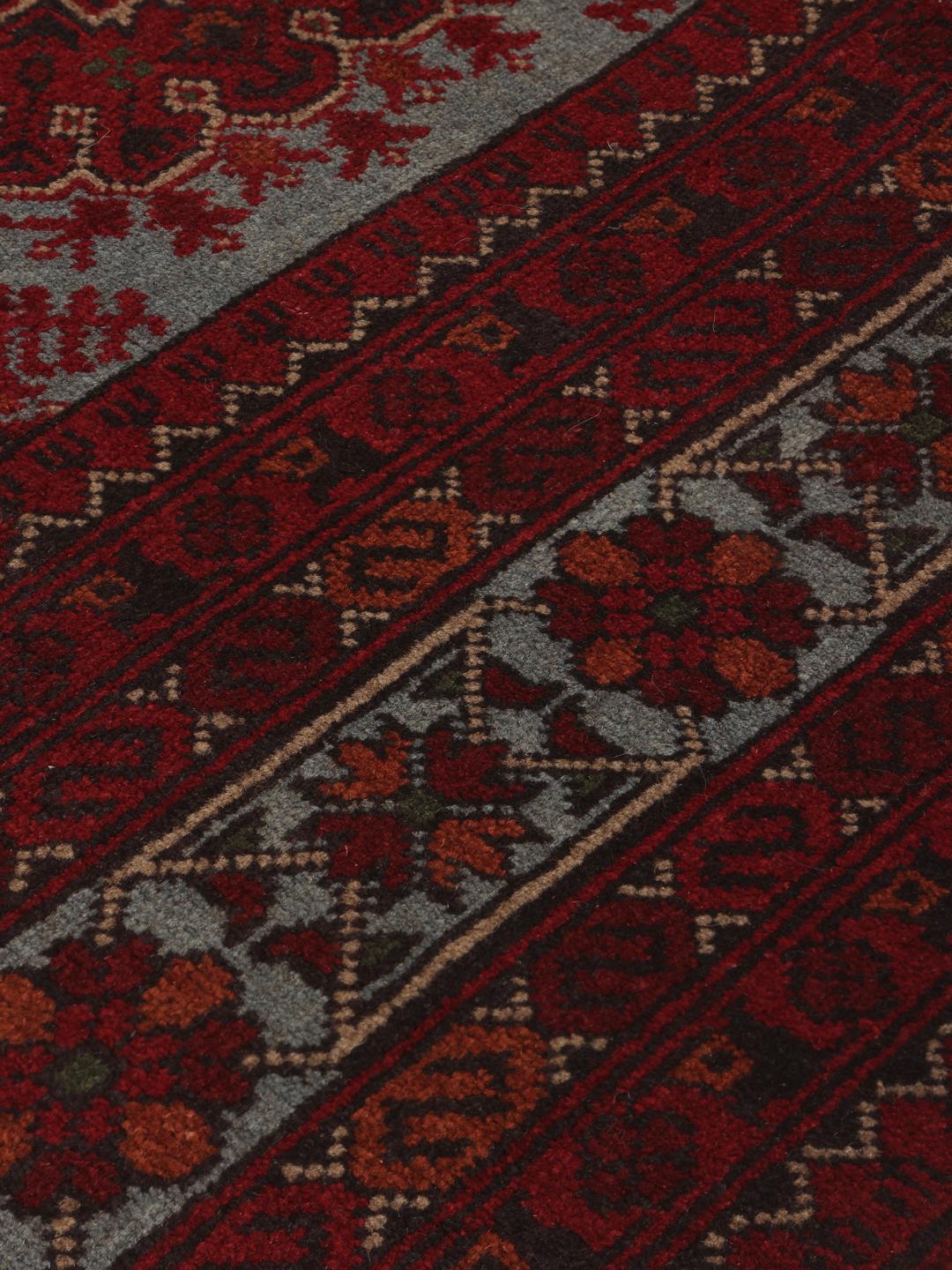 Hand-knotted Afghan Khal Mohammadi rug in deep red