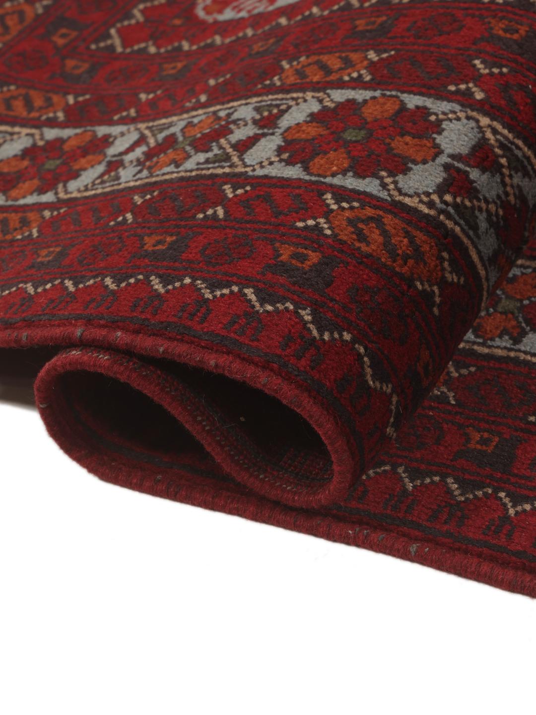 Hand-knotted Afghan Khal Mohammadi rug in deep red