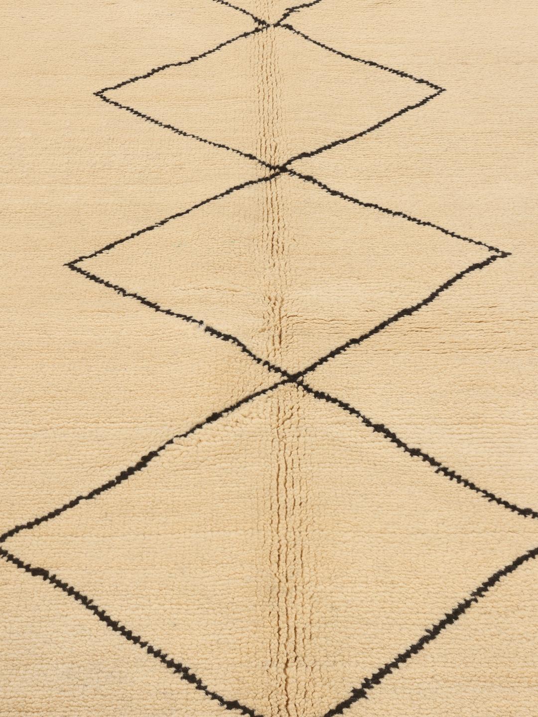 Hand-knotted Berber Style rug from the Middle East in beige with geometric patterns