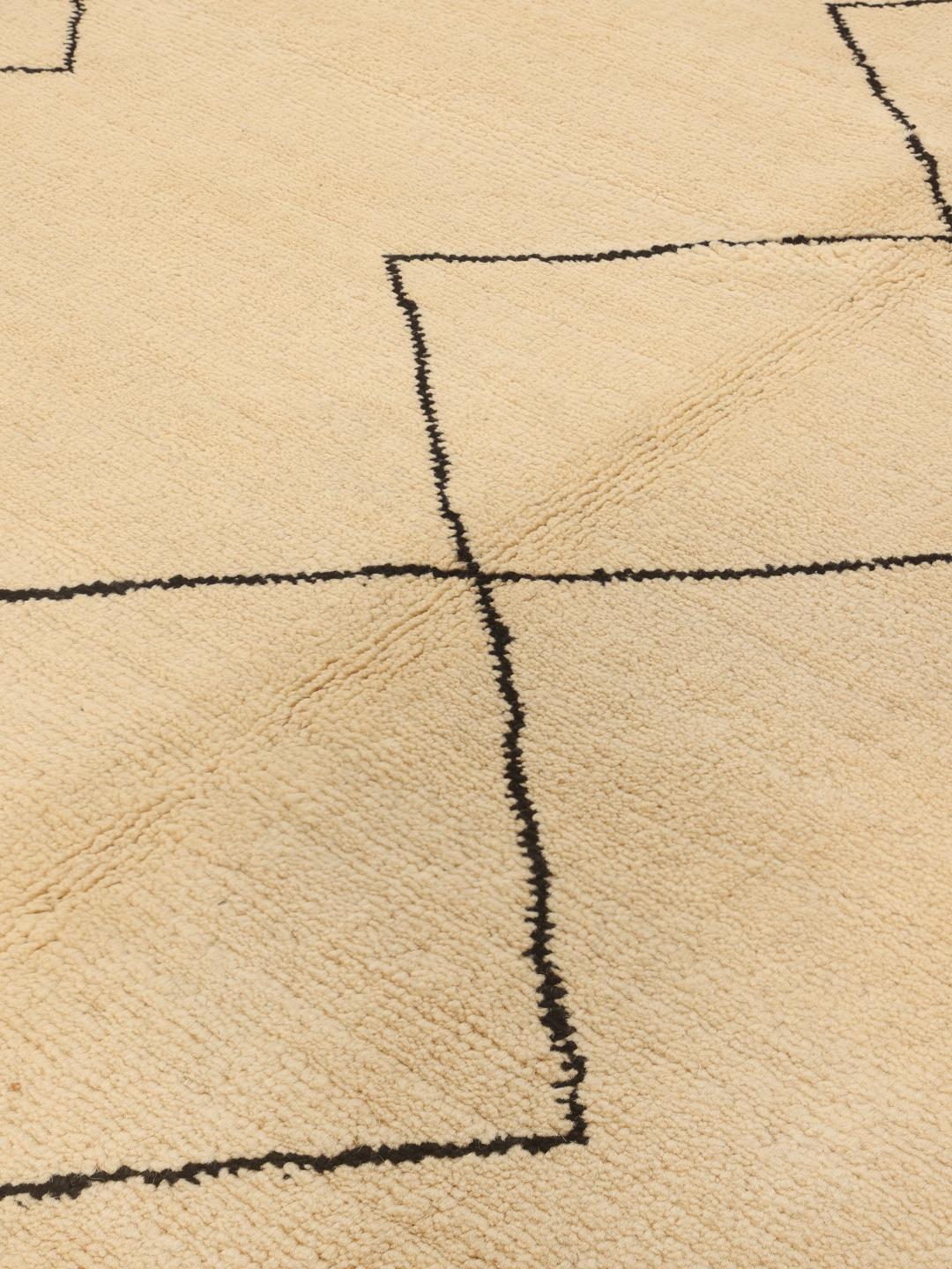 Hand-knotted Berber Style rug from the Middle East in beige with geometric patterns