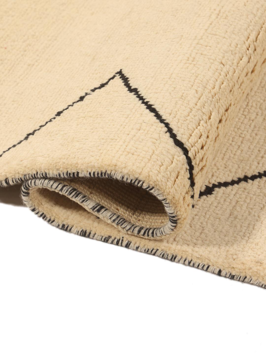 Hand-knotted Berber Style rug from the Middle East in beige with geometric patterns