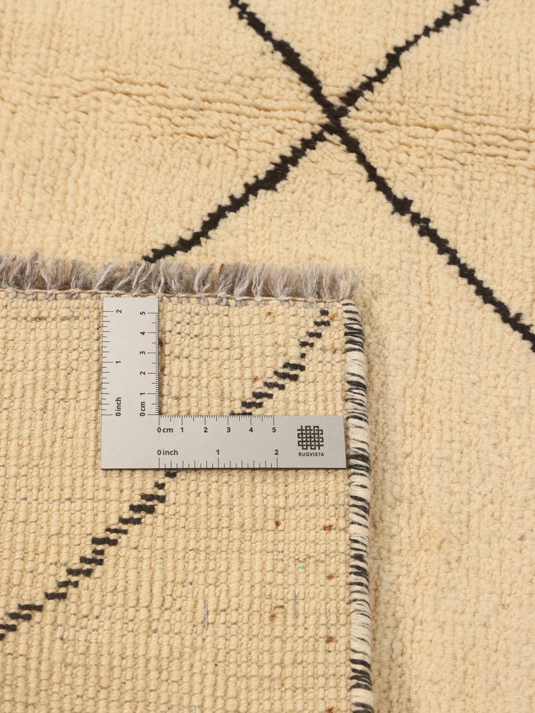 Hand-knotted Berber Style rug from the Middle East in beige with geometric patterns