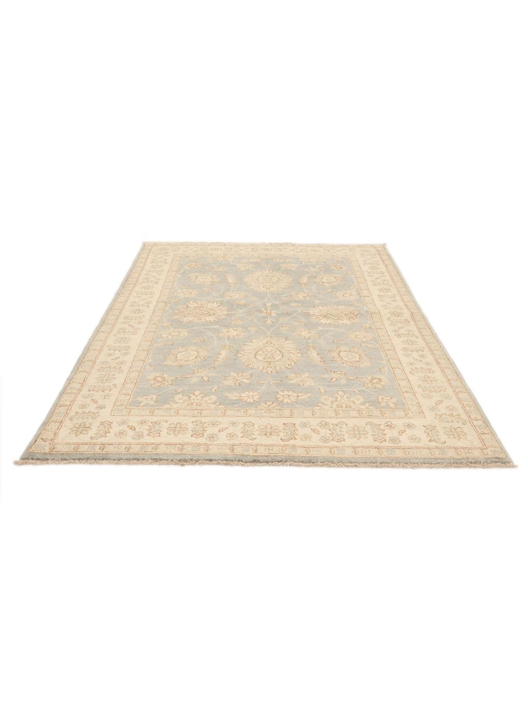 Handgeknoopt Ziegler tapijt uit Afghanistan met een bloemmotief in blauw en beige.