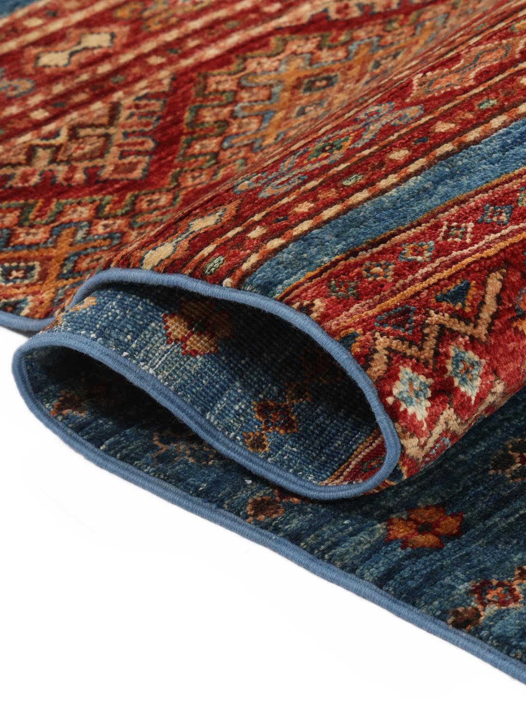 Handgeknoopt Afghaans tapijt met blauwe en rode geometrische patronen