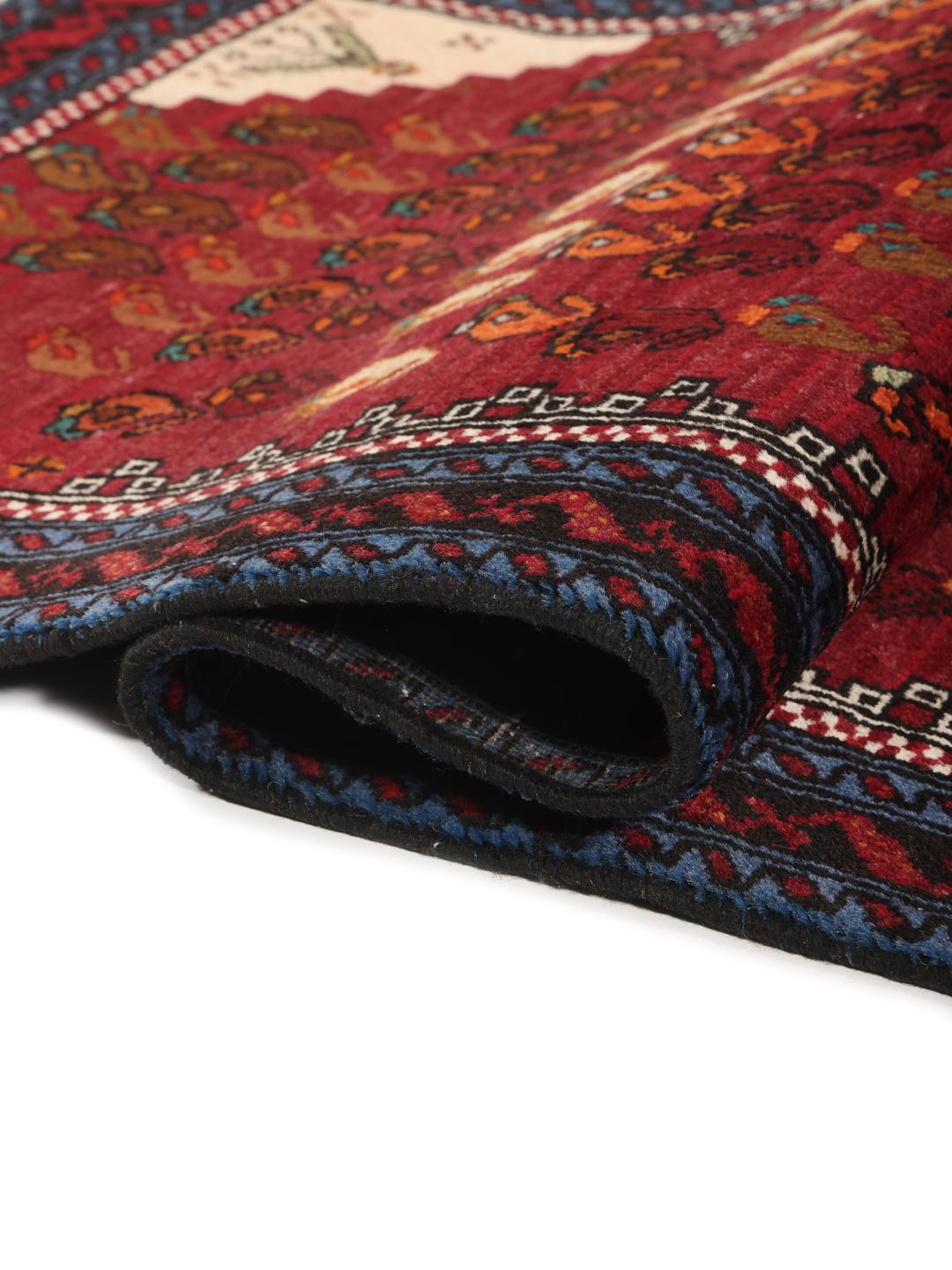 Handgeknoopte loper uit het Midden-Oosten in donkerrood met traditionele motieven