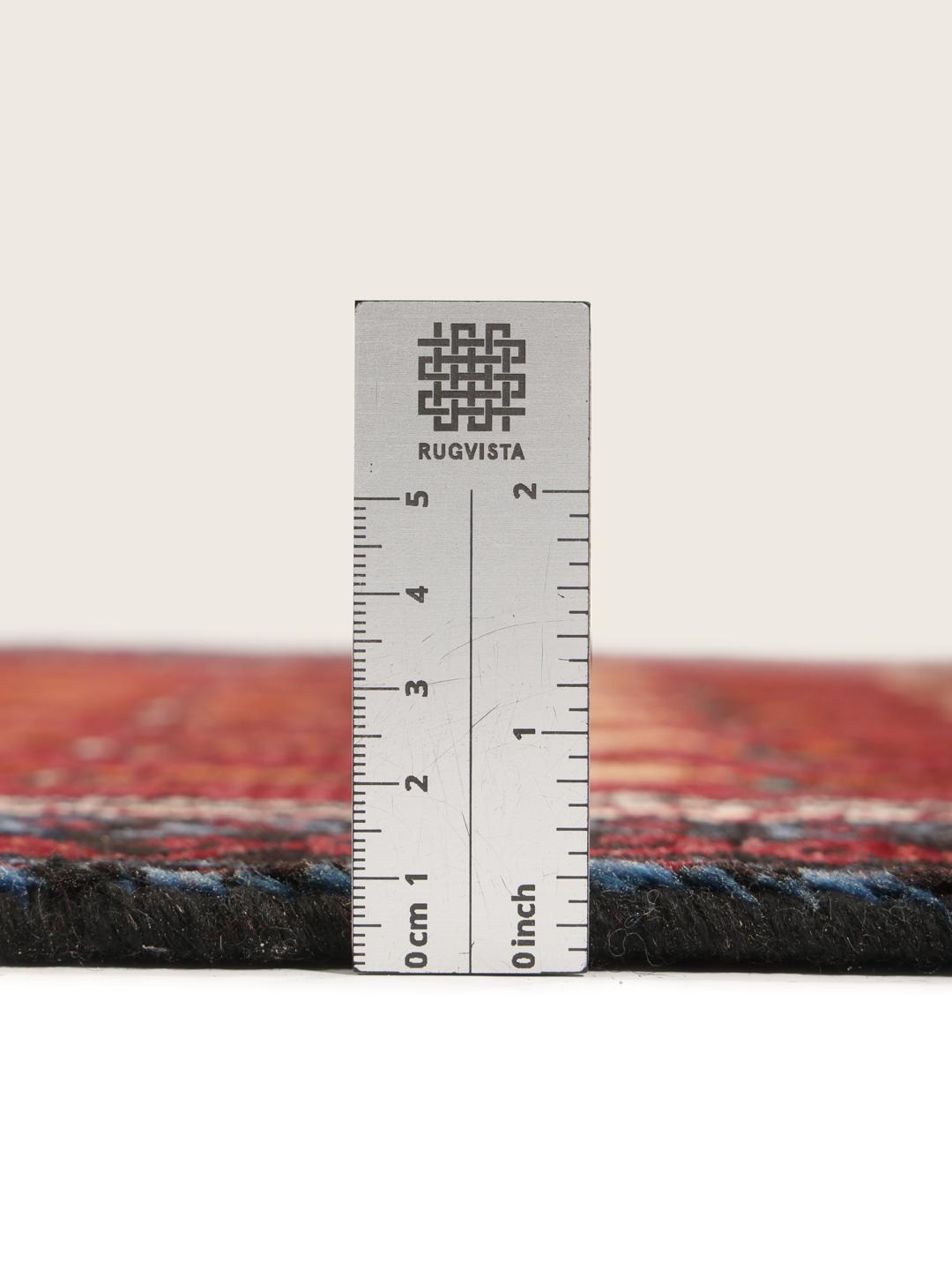 Handgeknoopte loper uit het Midden-Oosten in donkerrood met traditionele motieven