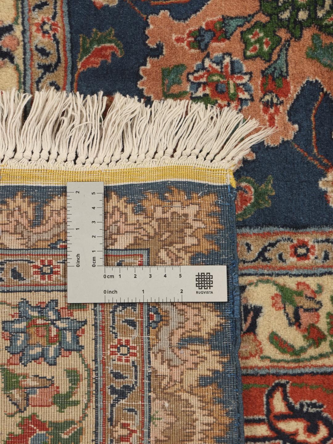 Håndknyttet Tabriz-tæppe med et blåt og rødt blomstermedaljondesign fra Mellemøsten